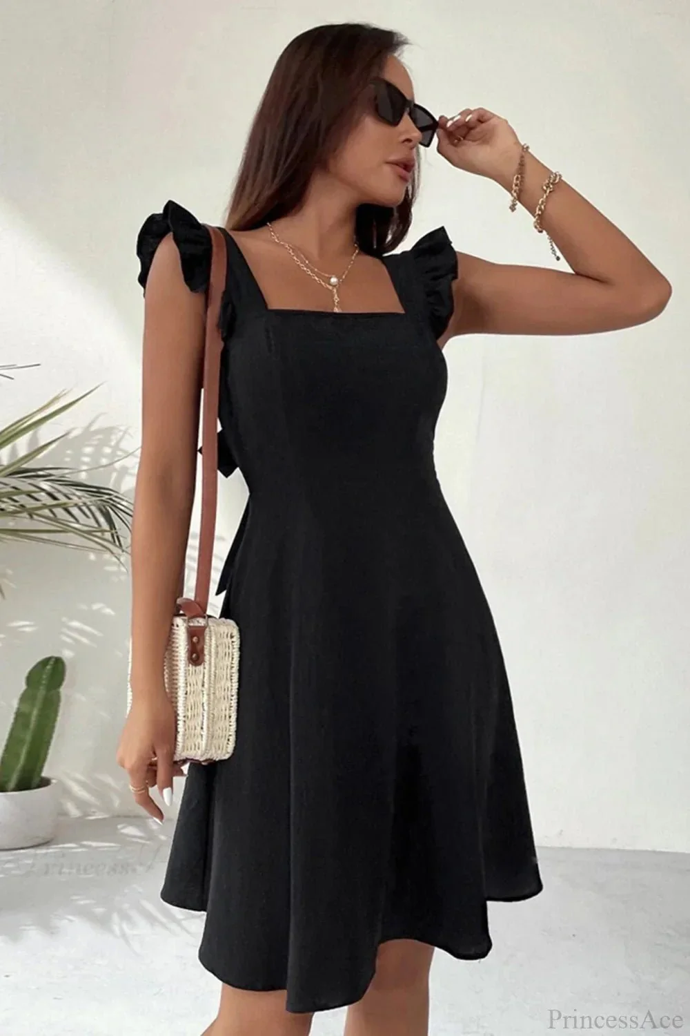 Bianca Sleeveless Mini Dress with Ruffle Tie-back - Image 10